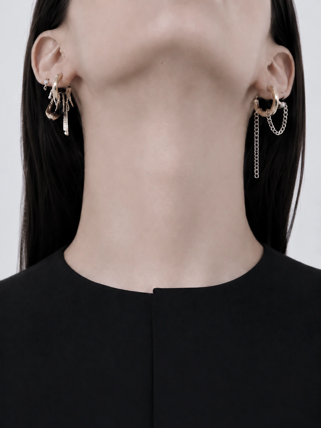 Subtle Senses study — neck and asymmetrical earrings